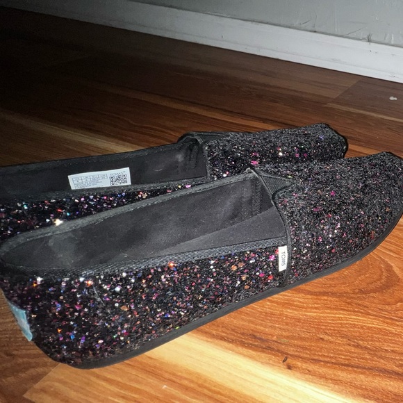 Shoes - Toms black sparkle shoes brand new worn once. Women’s size 8.
